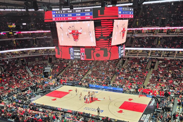 Experience the buzz of a Chicago Bulls game at the United Center where dedicated fans celebrate the spirit of basketball in an iconic setting filled with community pride and rich local culture.